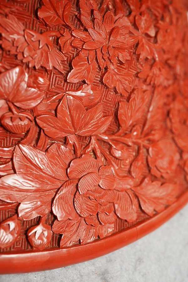 An unusual Chinese cinnabar lacquer ‘thousand flower’ footed dish, 18th/19th century